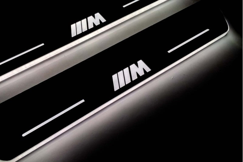 Umbrales de puerta LED BMW X5 F15 con logotipo HAMANN