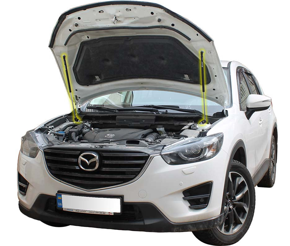 Hood strut kit installed on the Mazda CX-5 1st Gen (KE)