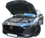 Carregar imagem no visualizador da galeria, Hood strut kit installed on the Mazda 3 4th Gen (BP)