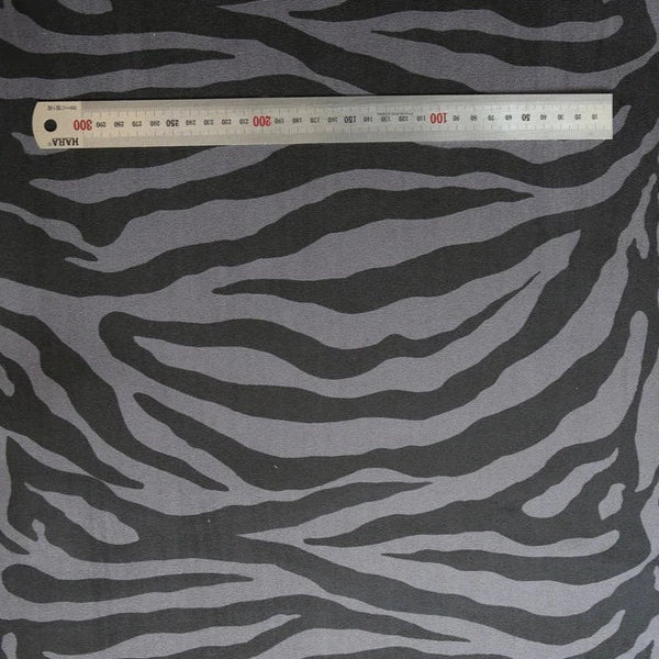 Adhesive span suede animal pattern fabric large dark grey zebra - decoinfabric