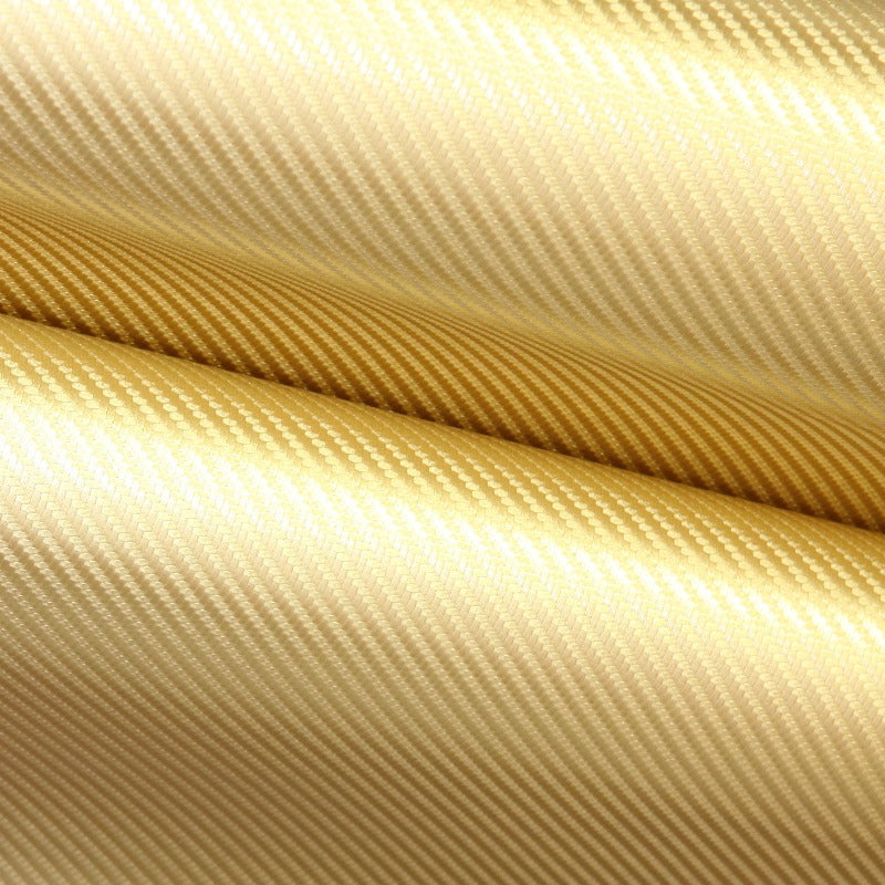 Adhesive carbon line texture fabric gold - decoinfabric